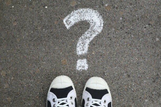 Standing at a crossroads, traveler facing a question about where to go next