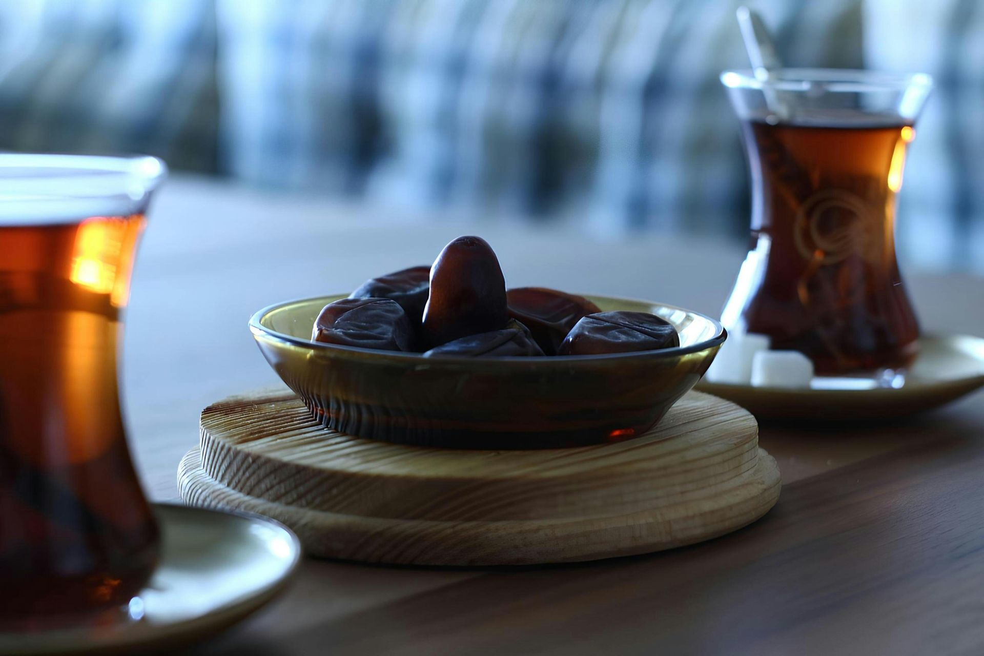 Traditional tea and assorted Middle Eastern desserts served on a decorative tray after iftar.